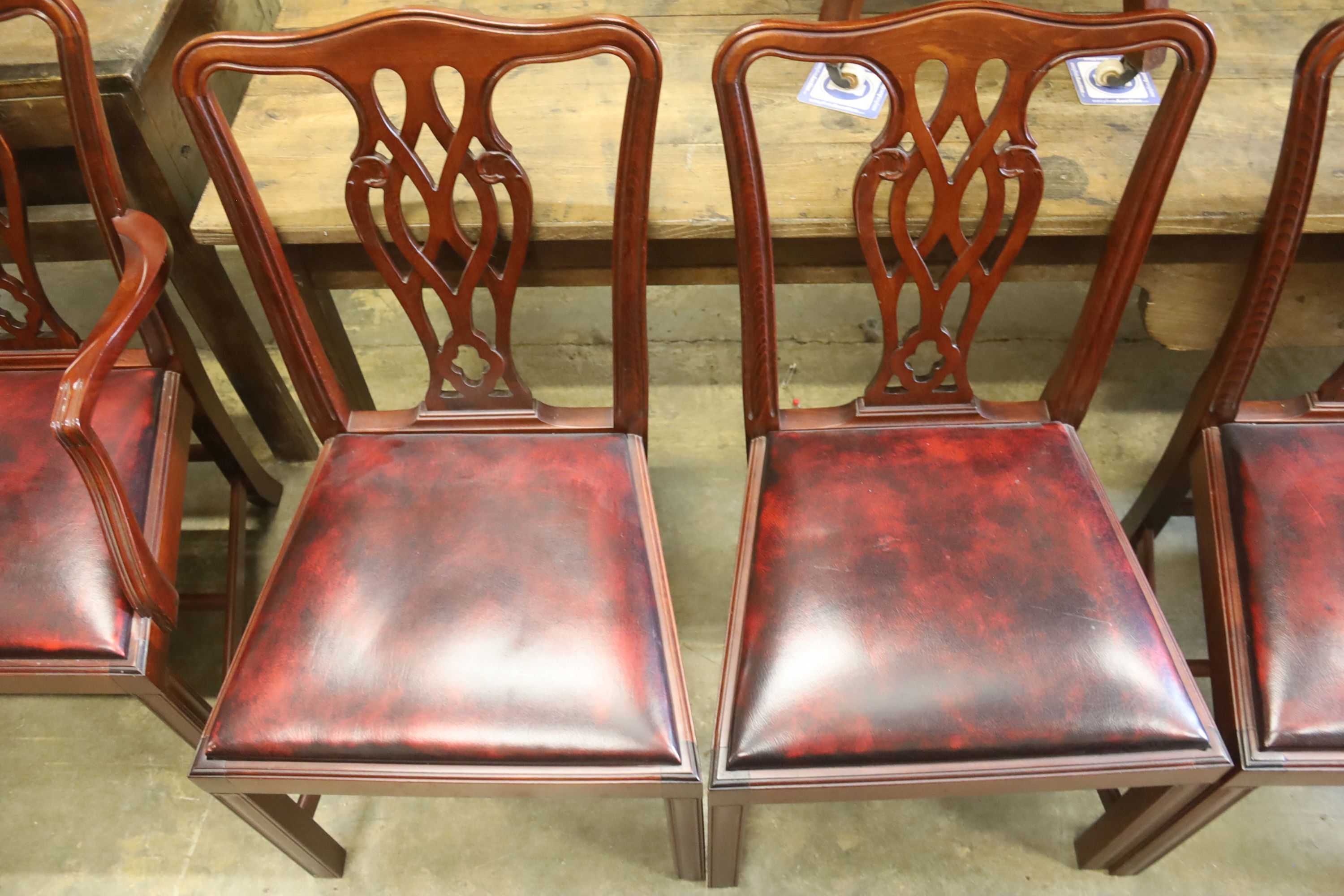 A set of eight Chippendale style mahogany dining chairs (2 arm, 6 single)